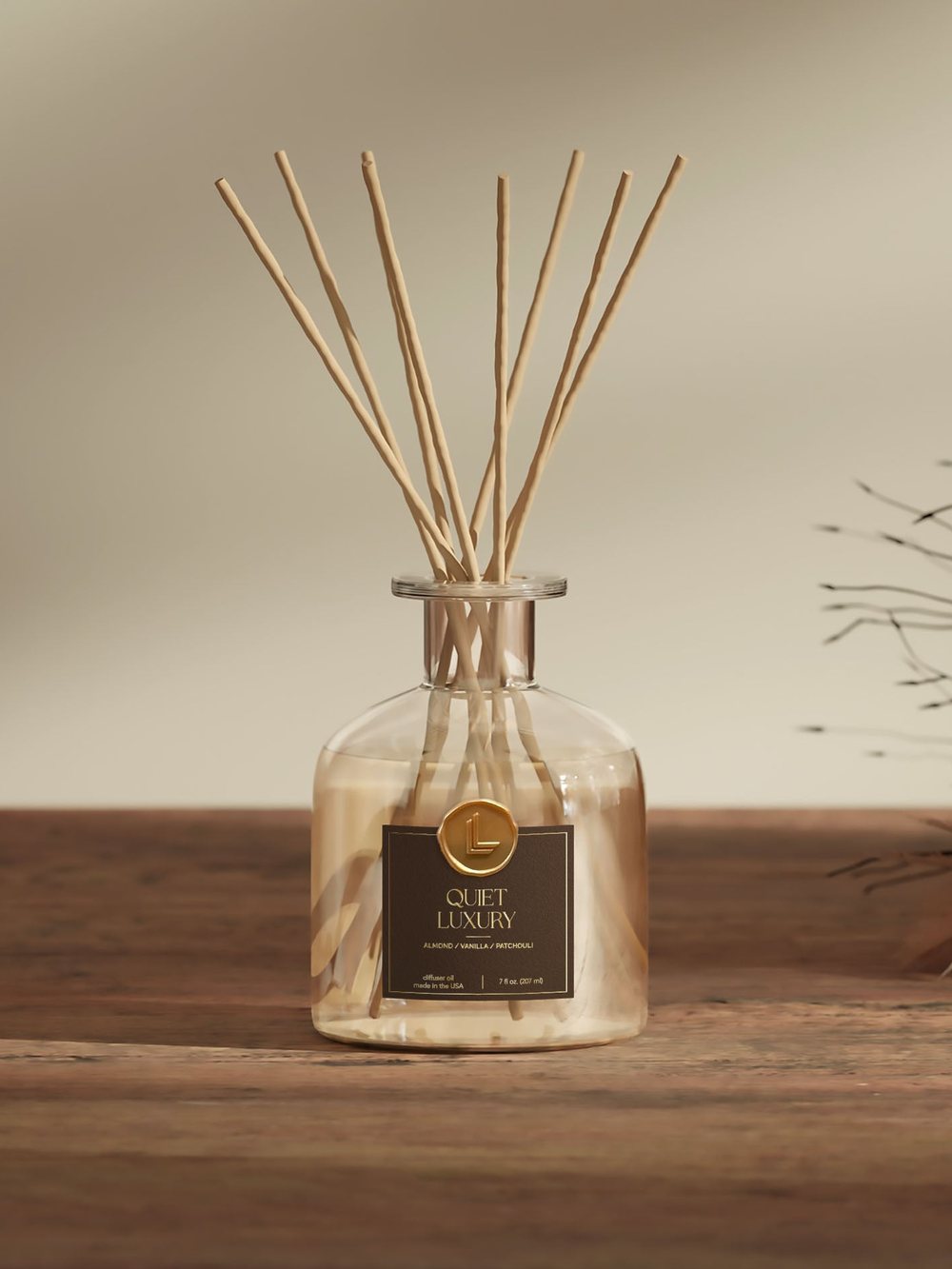 Quiet Luxury reed diffuser in a glass bottle
